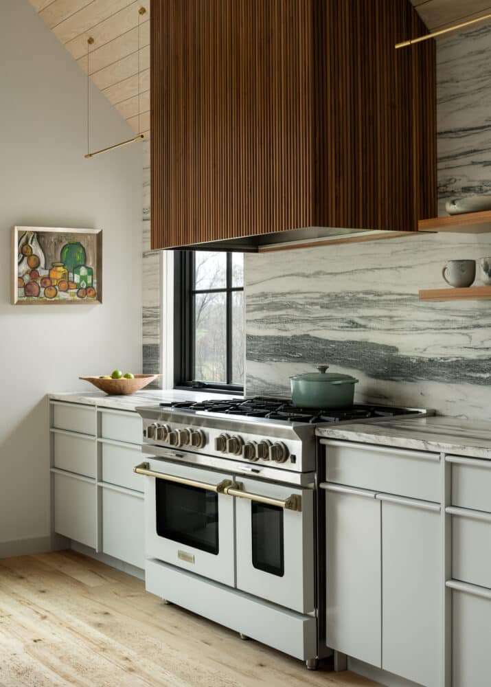 Warm colors with bold backsplash by BlueStar.